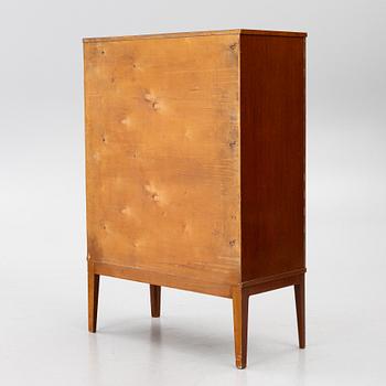 A Swedish Modern cabinet, 1940s.