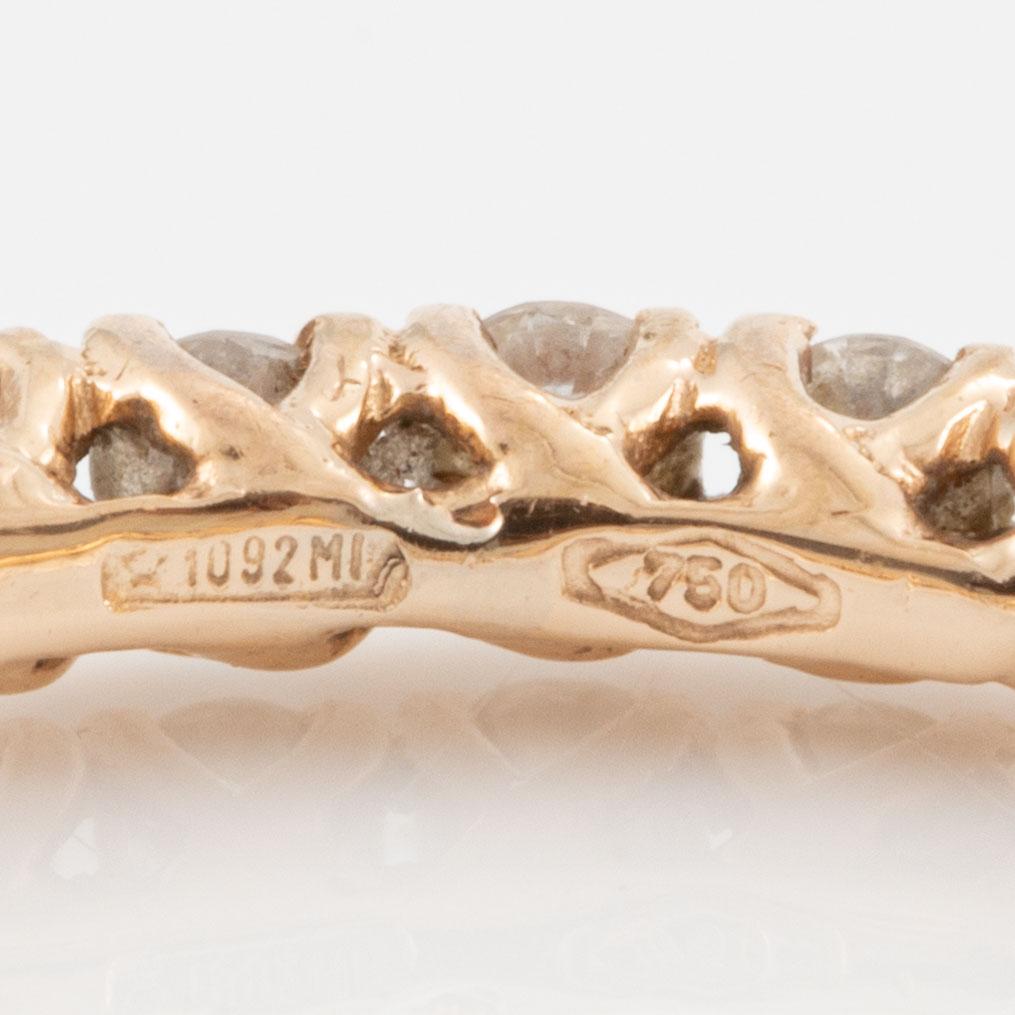 Rings, three pieces, set with brilliant-cut diamonds.