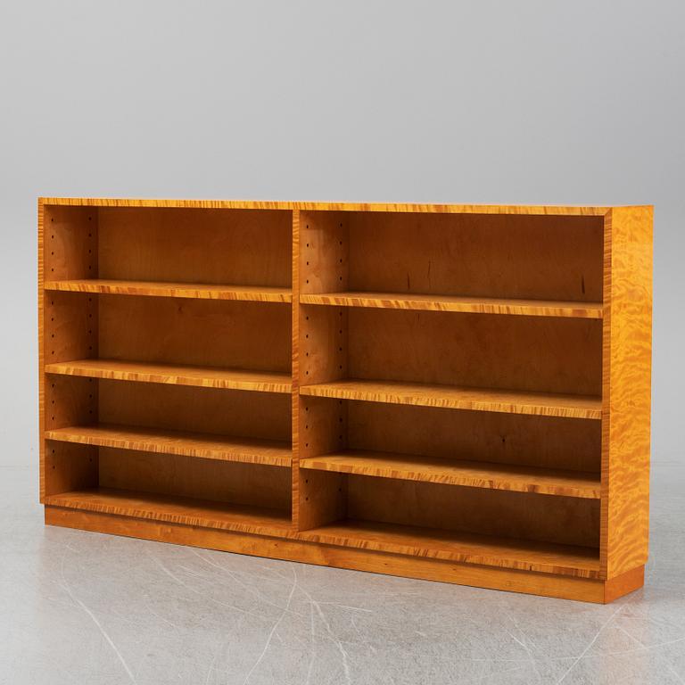 A 1940s birch veneered shelf.