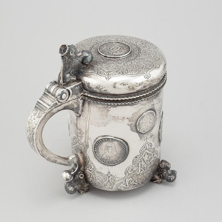 A parcel-gilt silver baroque style tankard.