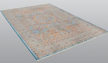 An oriental carpet with a Mamluk pattern, ca 299 x 210 cm.