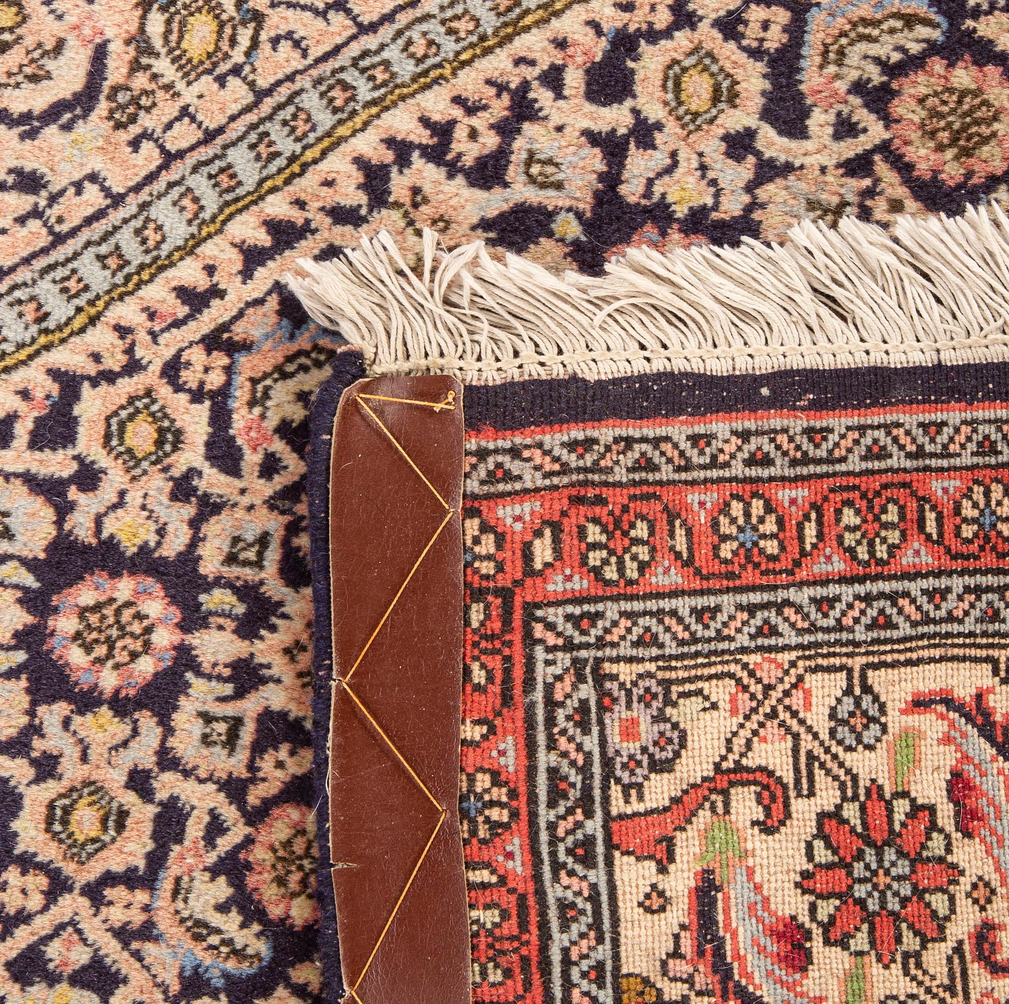 An old Bidjar carpet ca 302x195 cm.