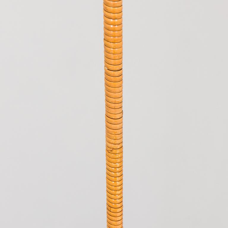 Paavo Tynell, a pair of mid-20th century K10-10 floor lamps for Taito Finland.