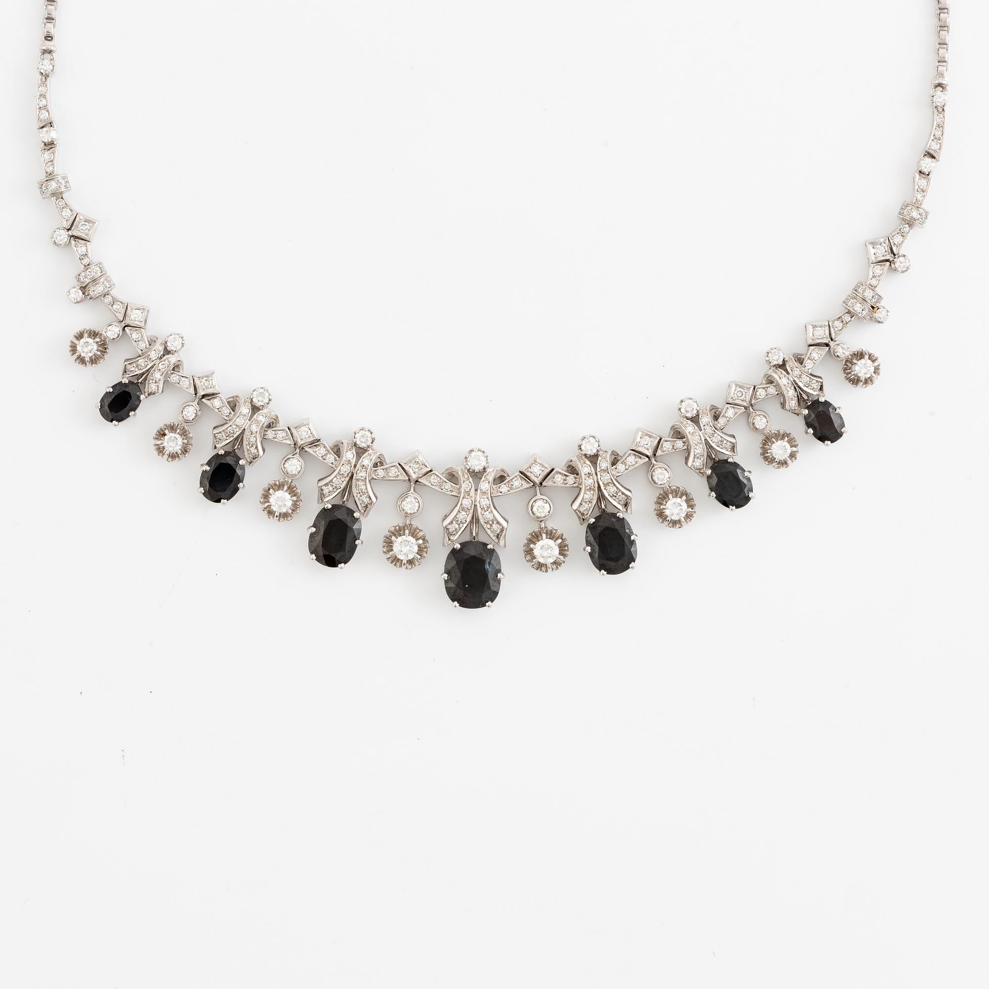 Necklace 18K white gold with step-cut sapphires and round and eight-cut diamonds.