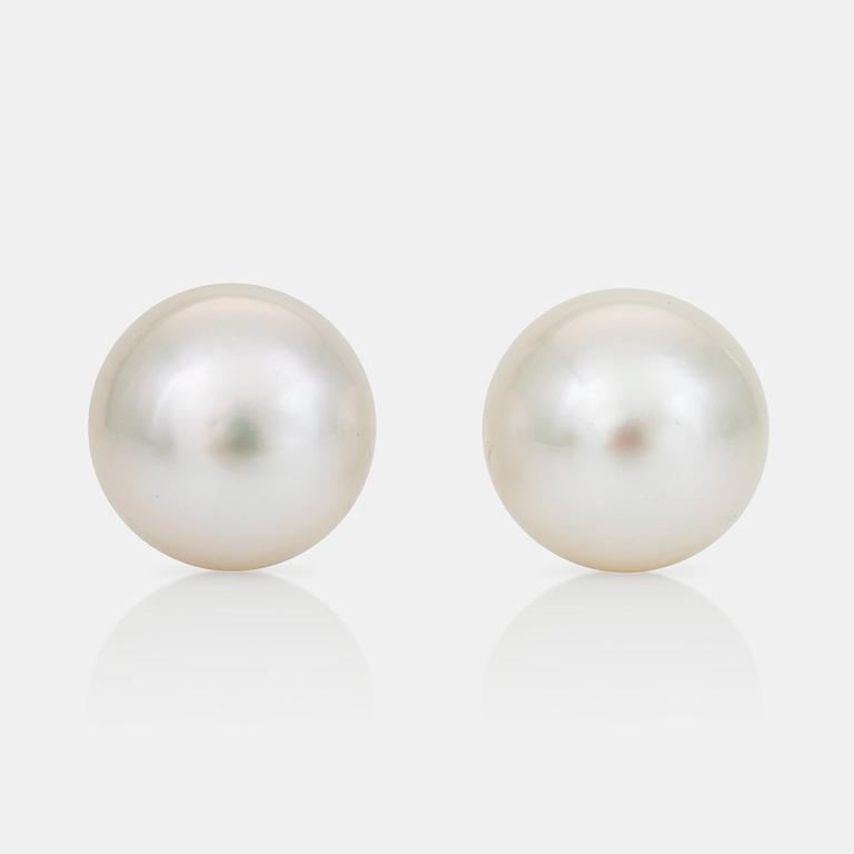 A pair of cultured South Sea pearl earrings.