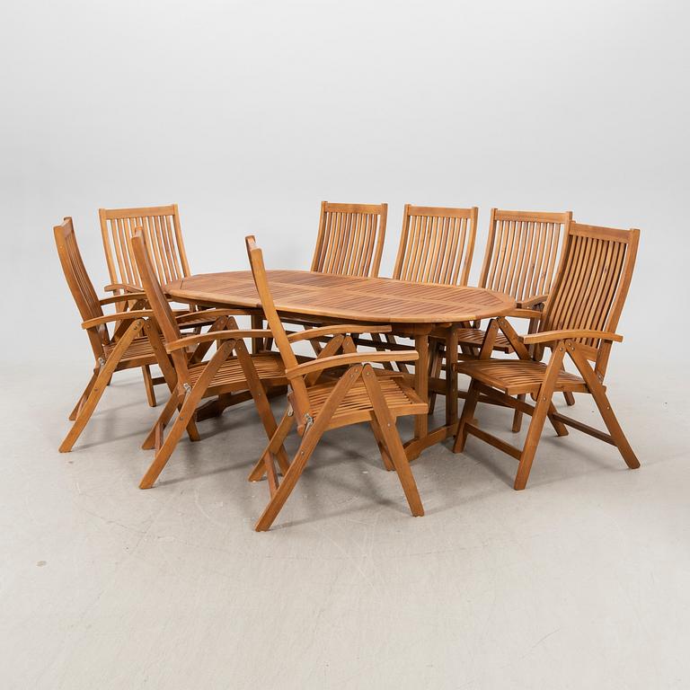 A 9 pcs stained teak garden suite by Brafab around 2000.
