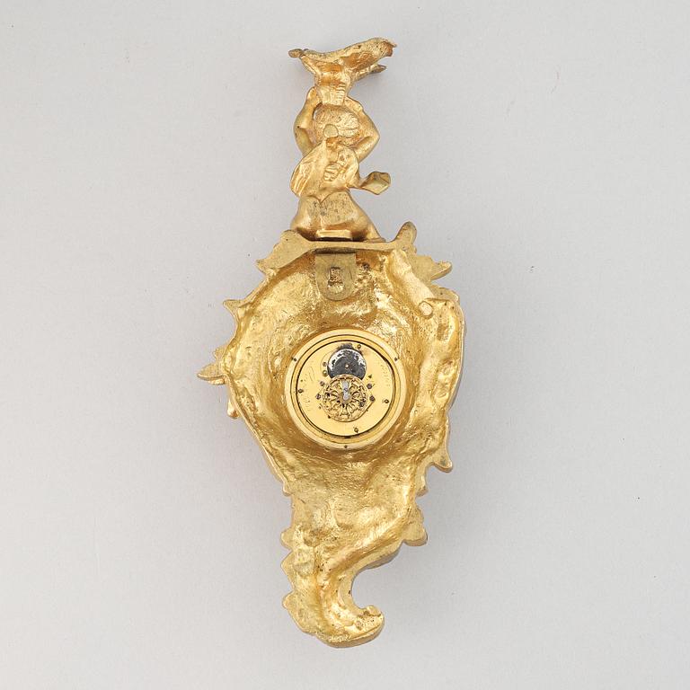 A late 19th century gilt bronze miniature wall clock, clock face signed Breguet a Paris.