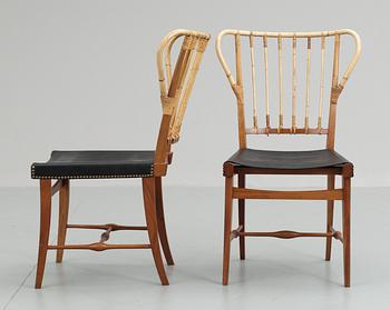 A pair of Josef Frank mahogany, bamboo and black leather chairs, Svenskt Tenn, model 1179.