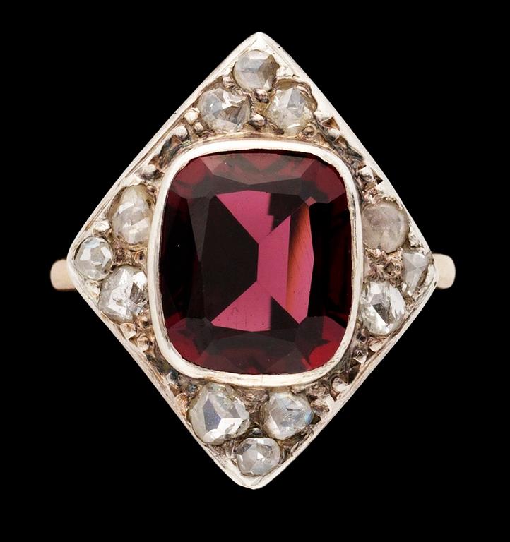 An antique garnet and diamond ring.