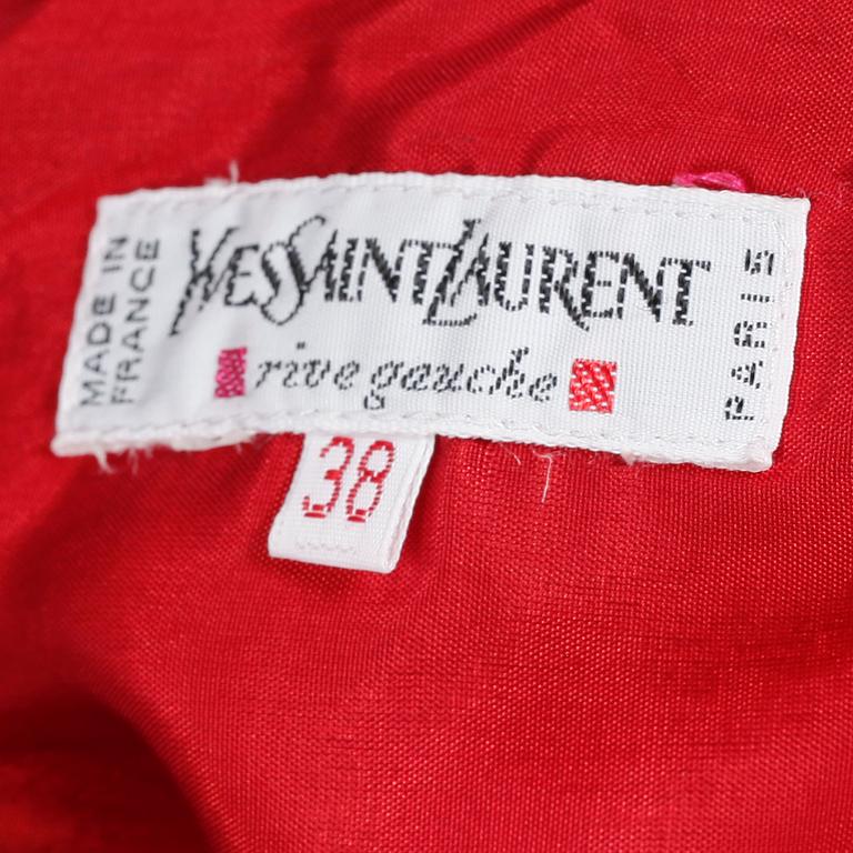 YVES SAINT LAURENT, a red skirt.