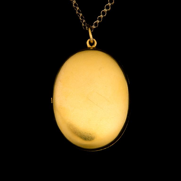 A PENDANT, facetted demantoids, 14K (56) gold. St Petersburg 1864-1908.