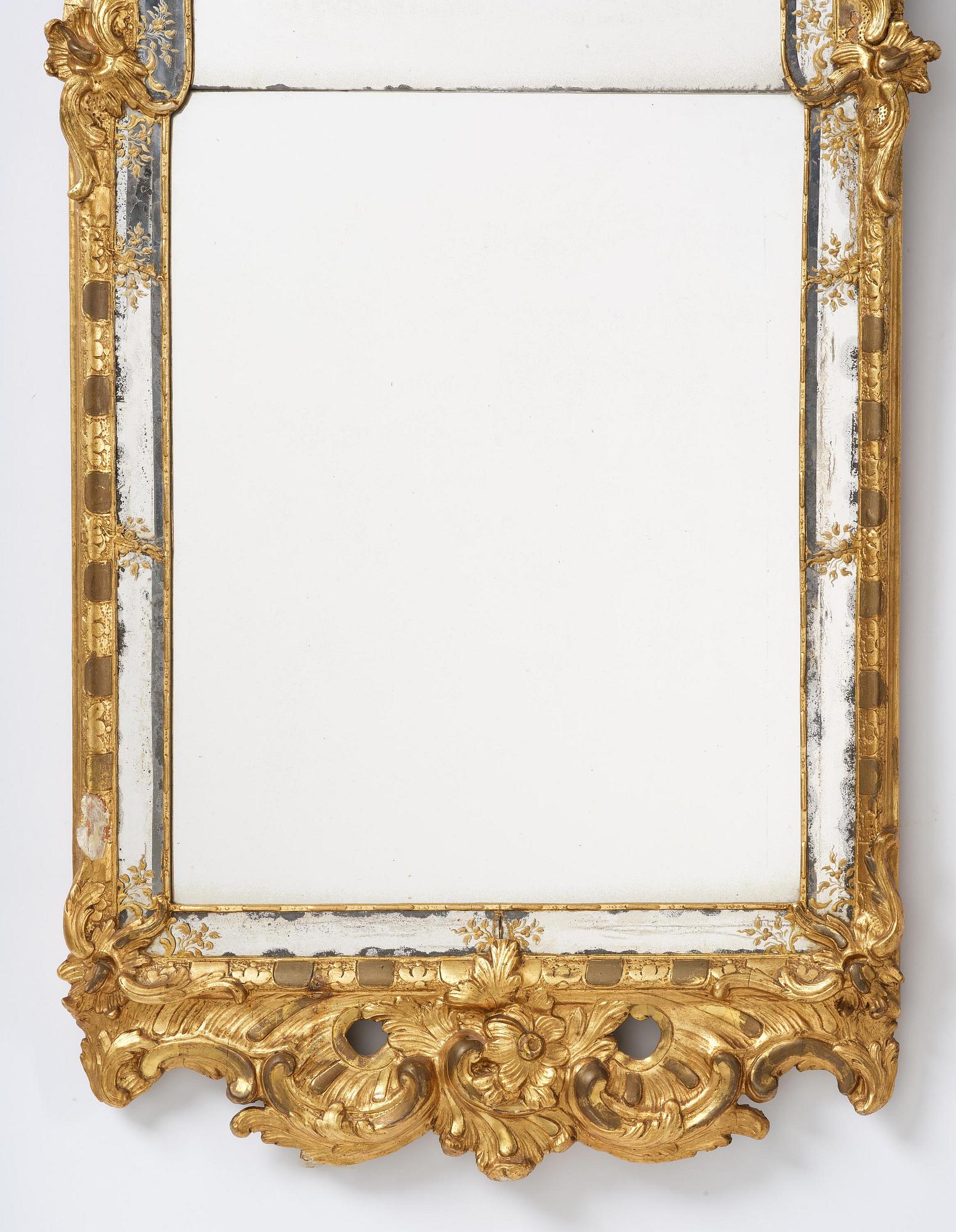 A giltwood rococo mirror, Stockholm, later part 18th century.