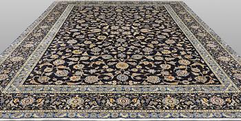 A Keshan carpet, approx. 440 x 308 cm.