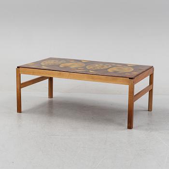 A walnut coffee table, 1960's/1970's, signed Baco.