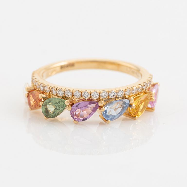 Multi coloured sapphire and brilliant cut diamond ring.