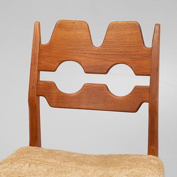 Henning Kjærnulf, a set of six oak 'Razorblade' chairs with new sheepskin upholstery, Nyrups, Denmark, 1960s.