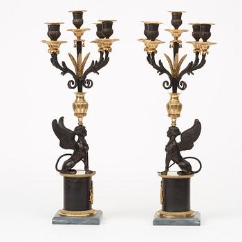 A pair of Russian Louis XVI-style 19th century five-light candelabra.