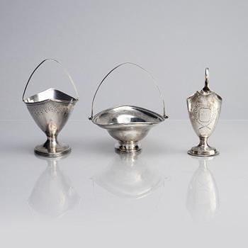 Two silver bowls and one creamer, London, England, 18th century.