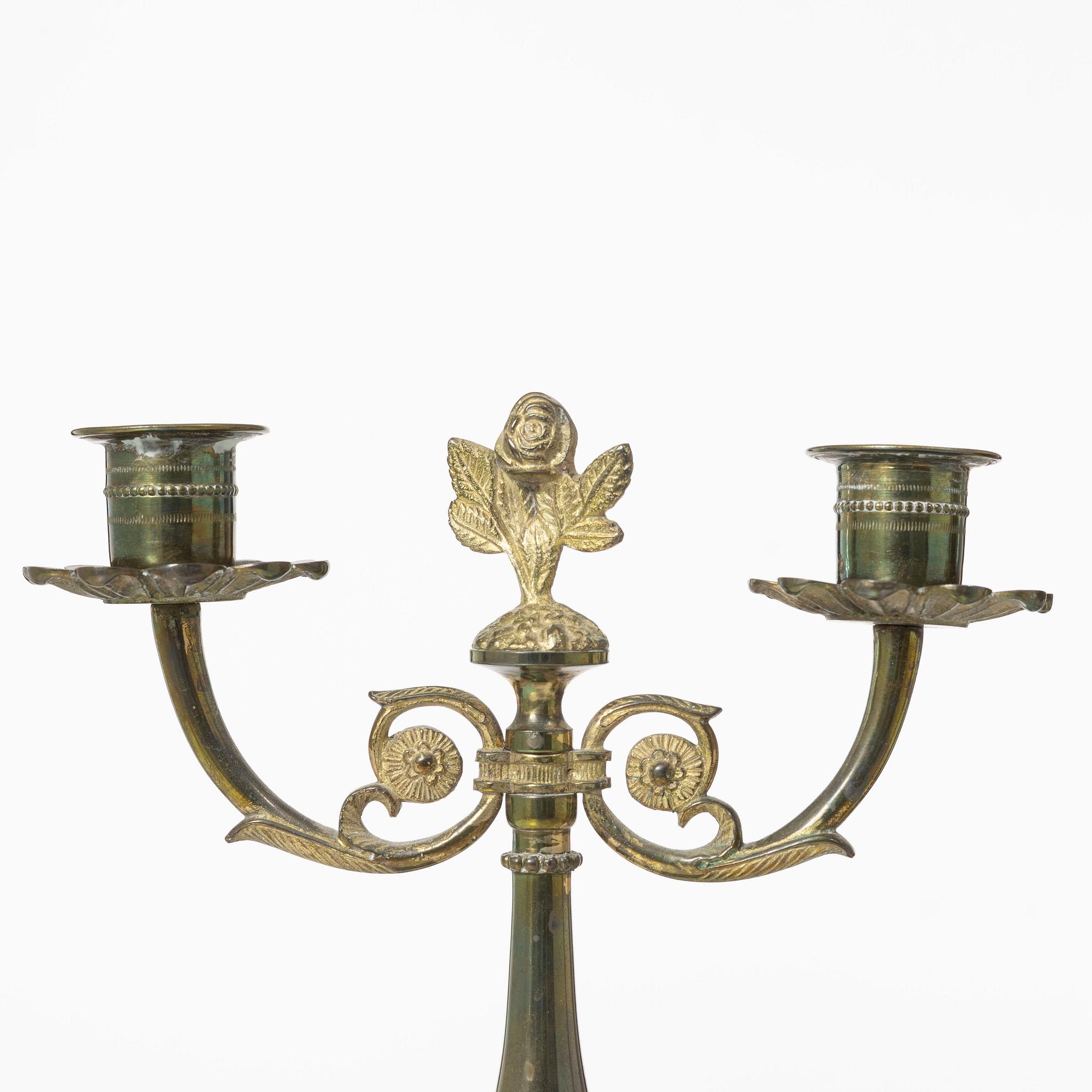 Candle holders, a pair of brass, Empire style, 20th century.
