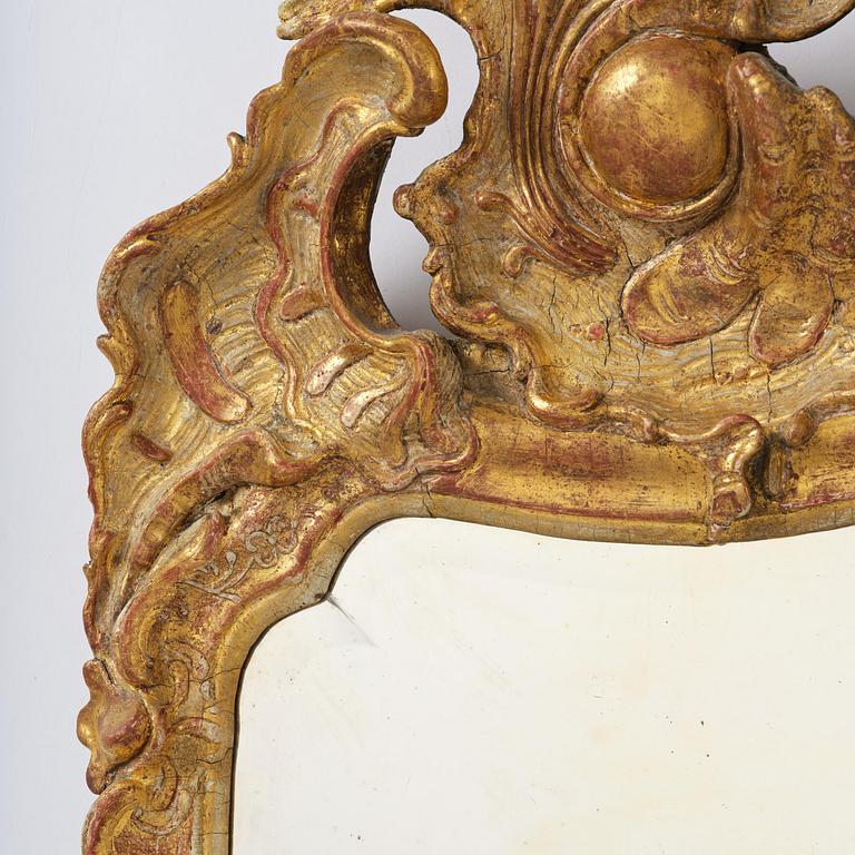 A rococo giltwood mirror attributed to E. Göbel (master in Stockholm 1744-64).