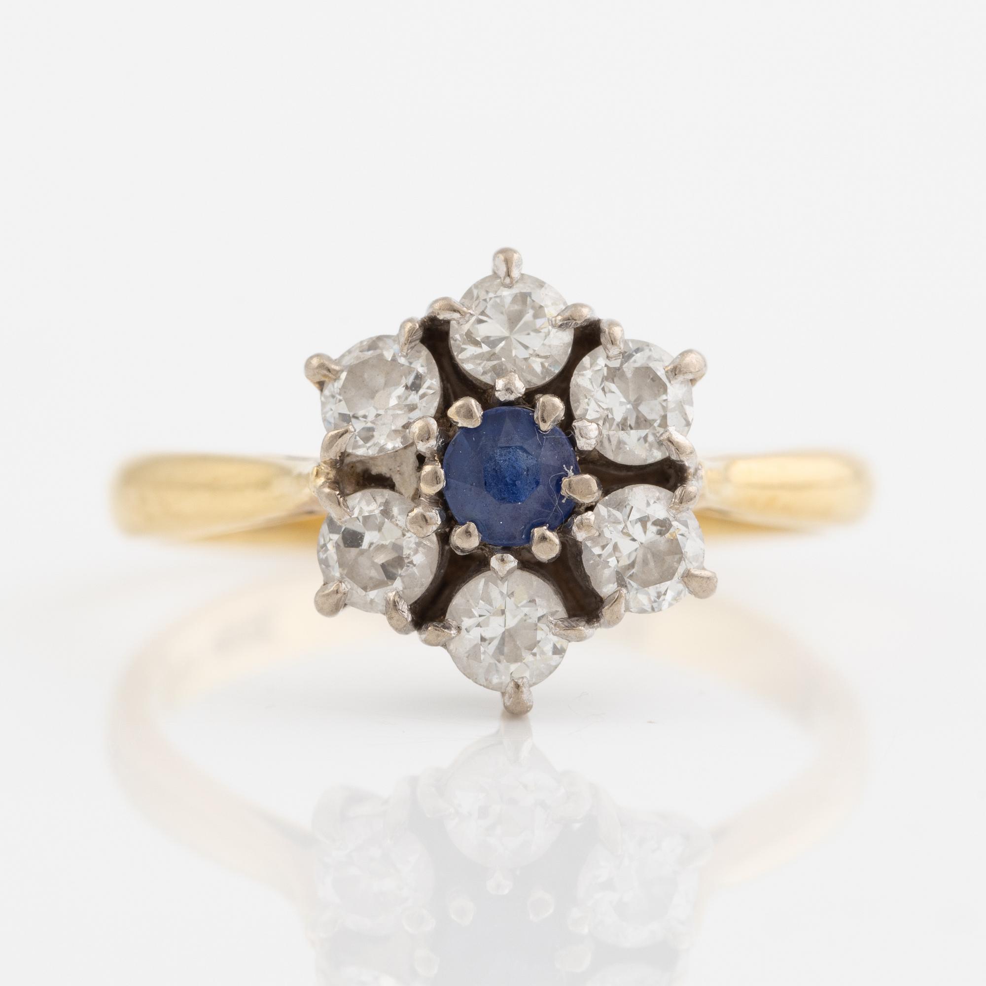 Ring, 18K gold with sapphire and brilliant-cut diamonds.