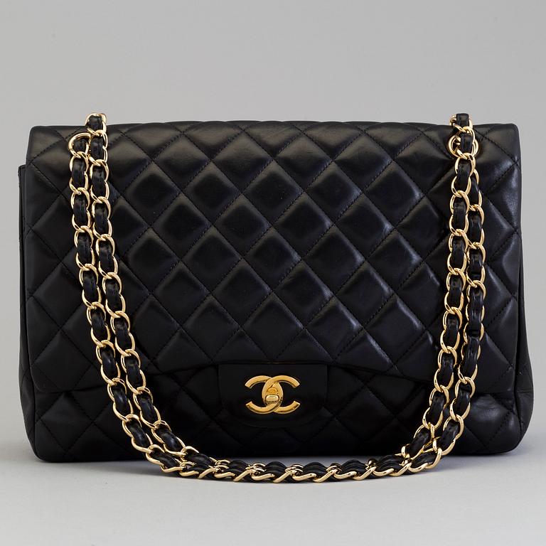 A "Double flap bag maxi" by Chanel 2009-10.