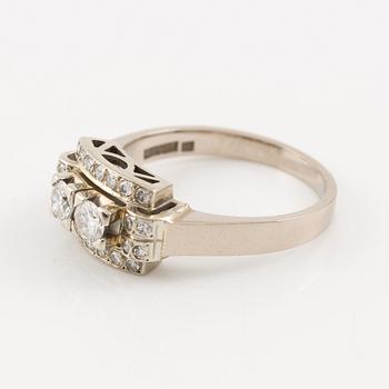 Ring in 18K white gold set with round brilliant-cut and eight-cut diamonds.