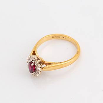 Navette cut ruby and brilliant cut diamond ring.