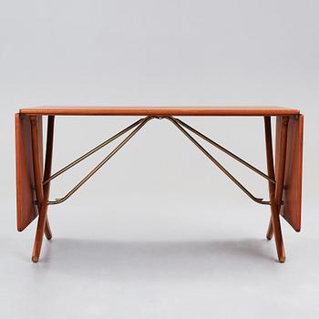 Hans J. Wegner, a teak, beech and brass dining table model "AT-314", for Andreas Tuck, Denmark 1950-60's.