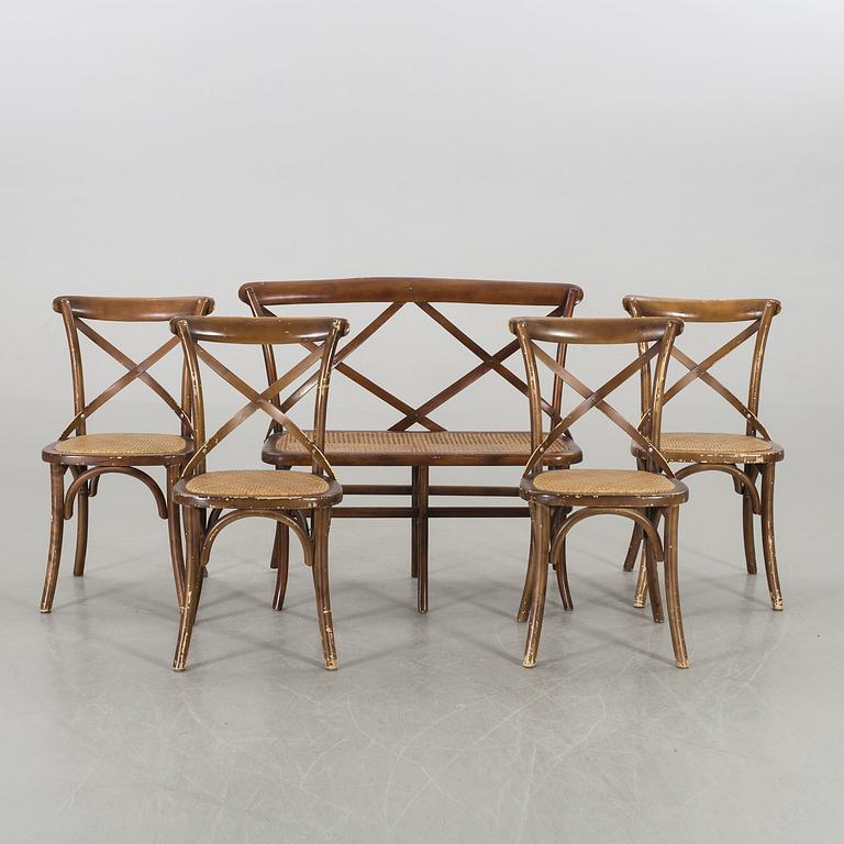 A wooden sofa, a table and four chairs, later part of the 20th century.