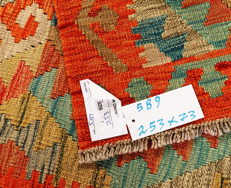 A Kilim runner, Afghanistan, c. 253 x73 cm.