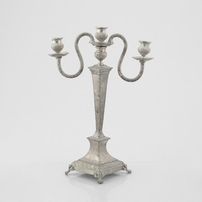 Candelabrum and two candlesticks, tin, by Nils Justelius and Niclas Anström, Eksjö and Växjö, first half of the 19th century.