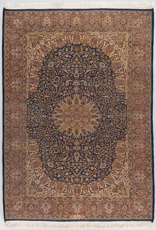 A signed rug, oriental, ca. 242 x 168 cm.
