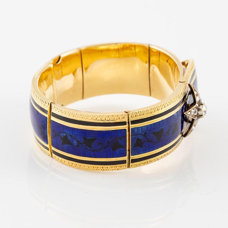 A bangle in 18K gold set with old-cut diamonds and blue enamel, France mid-19th century.