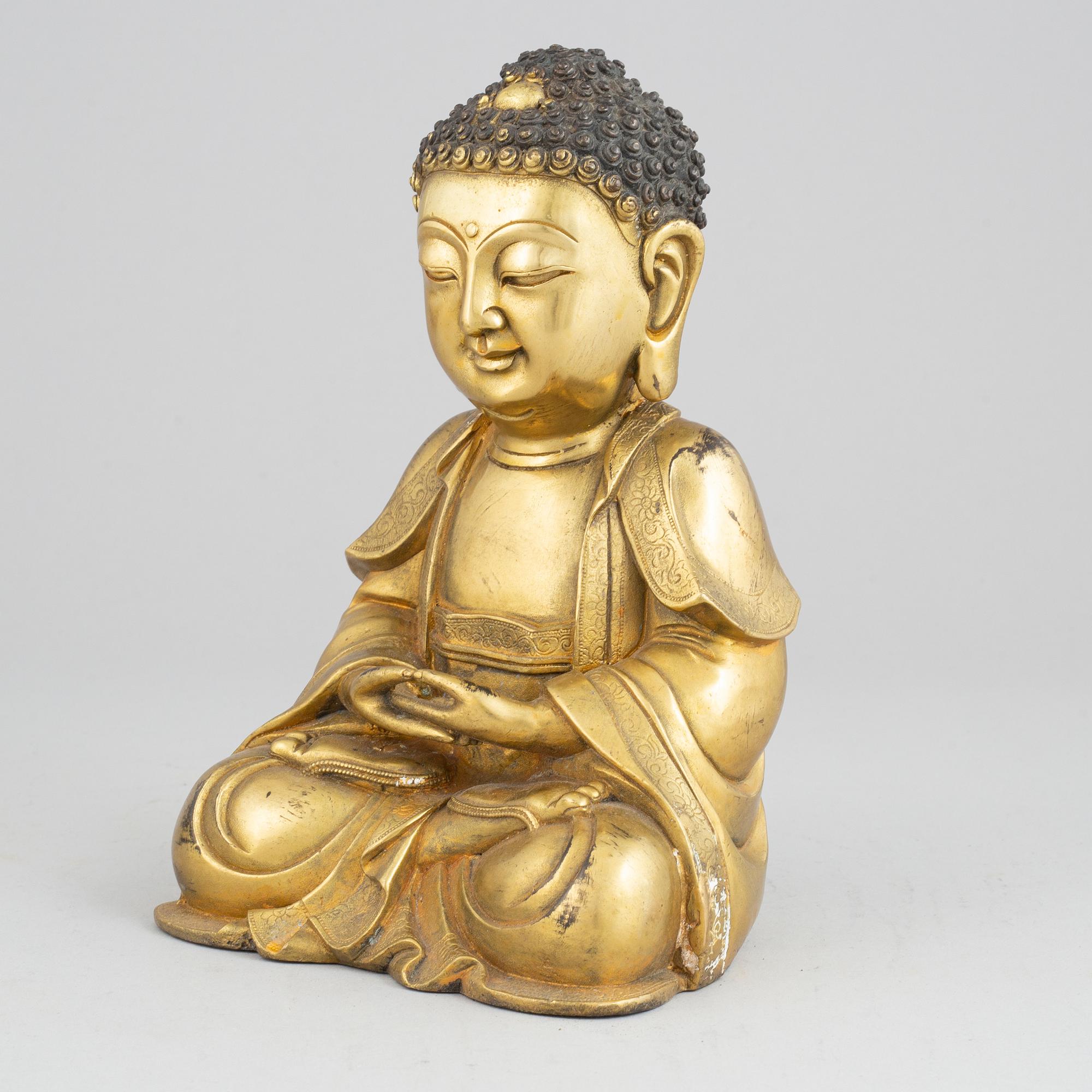 A bronze buddha, Ming style, 20th century.
