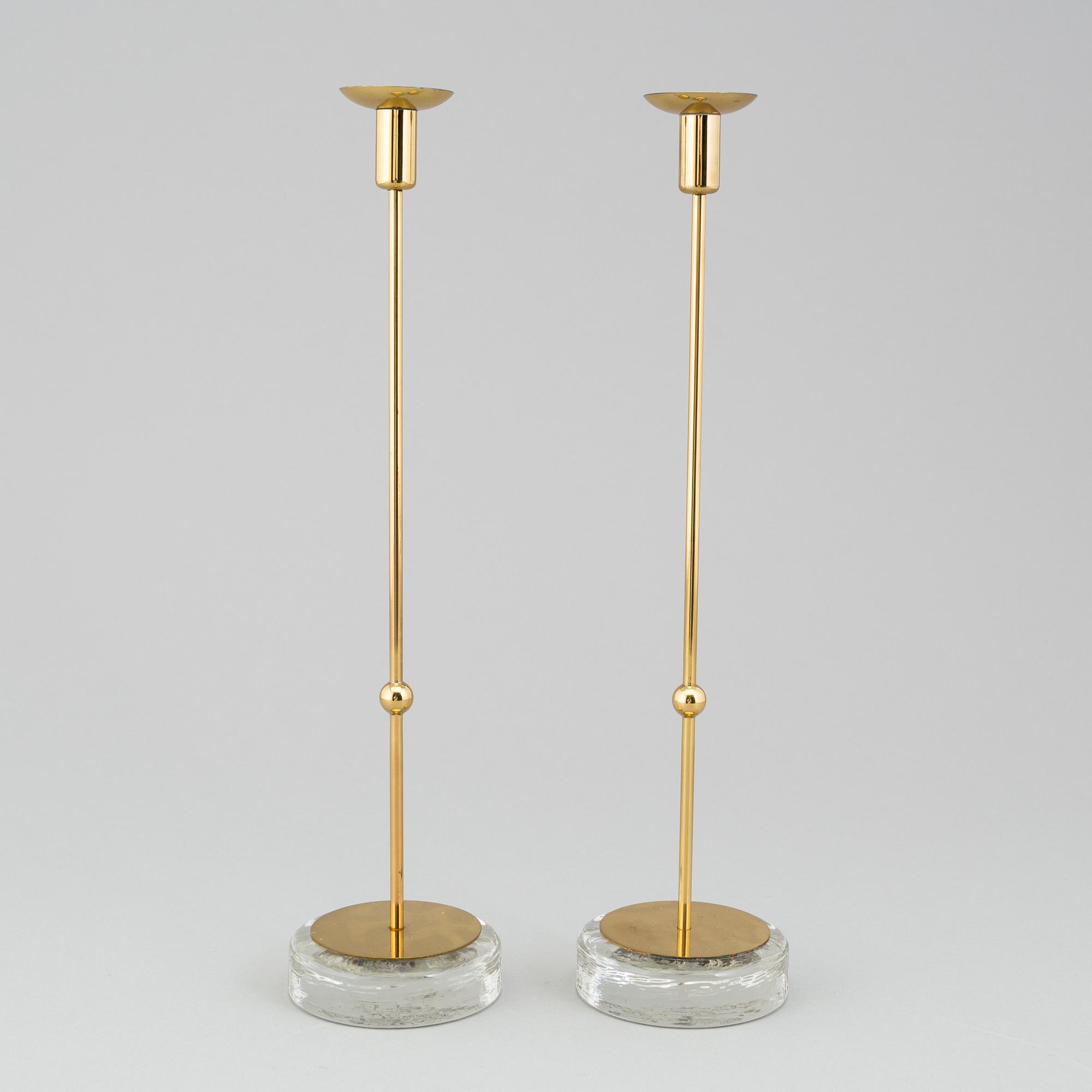GUNNAR ANDER, A pair of Ystad metall brass candlesticks.