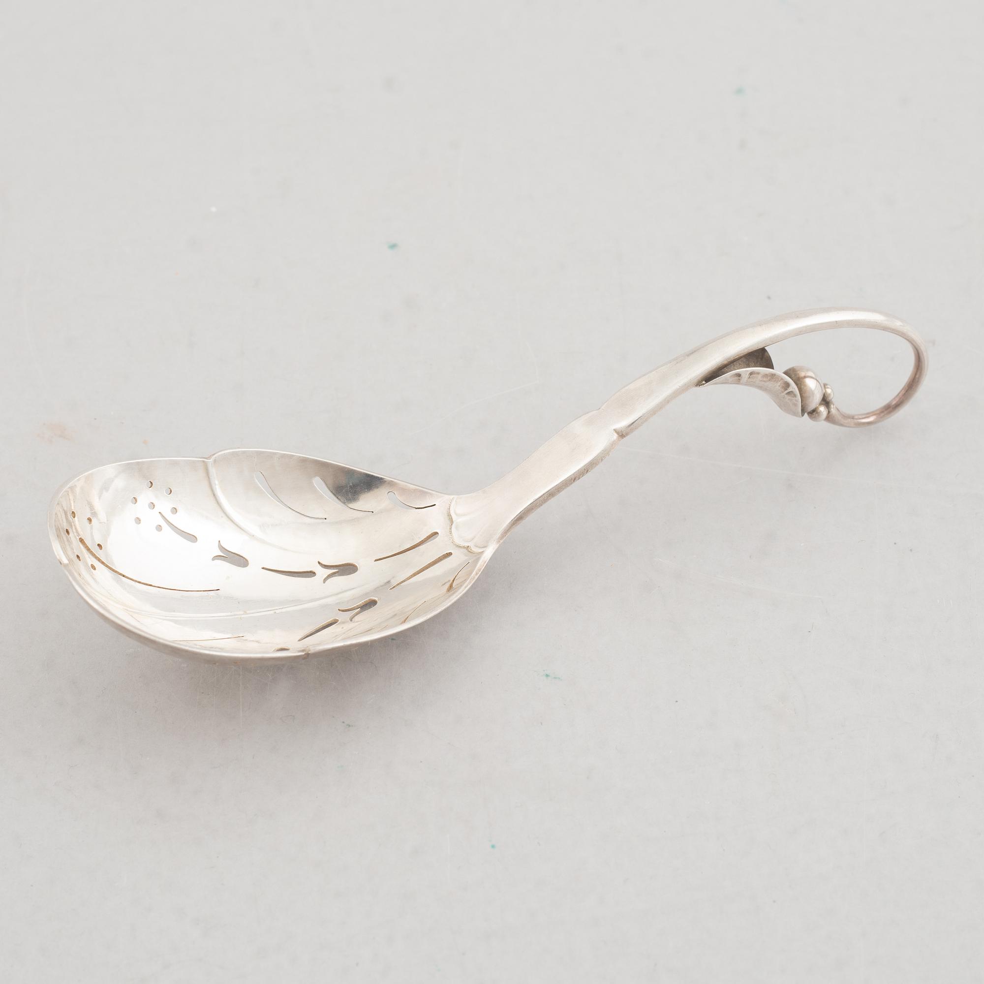 Two Silver Serving Spoons, including Georg Jensen.