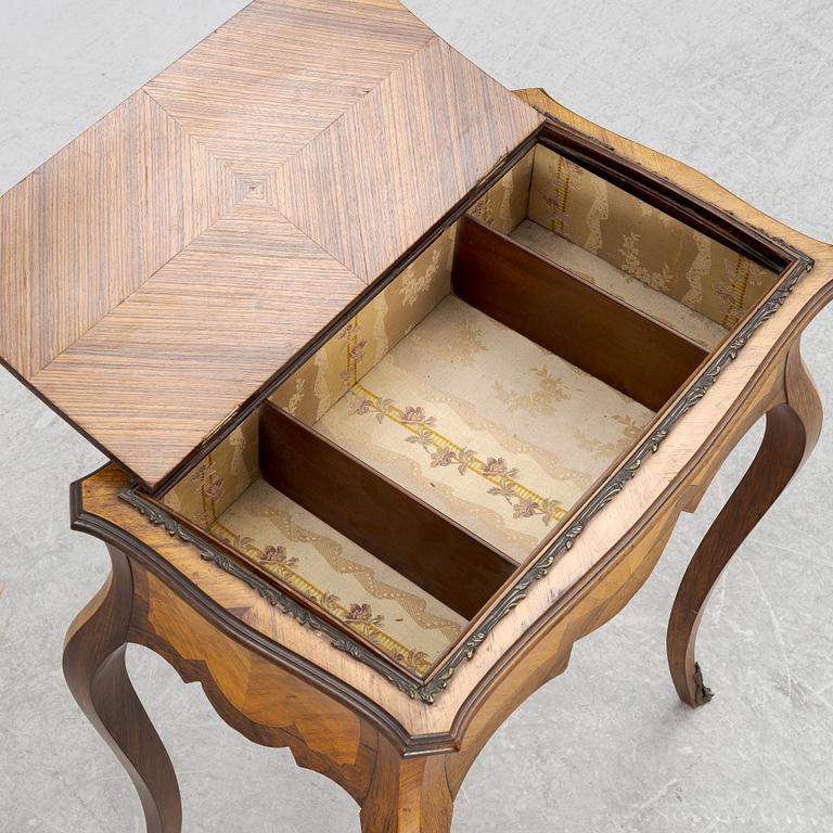 A Louis XV style table, circa 1900.