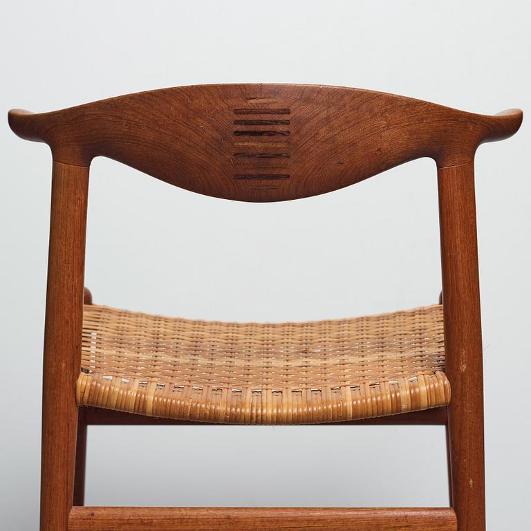 Hans J. Wegner, a set of six teak and rattan "Cowhorn Chairs" "JH-505", executed by cabinetmaker Johannes Hansen, Denmark 1950-60's.