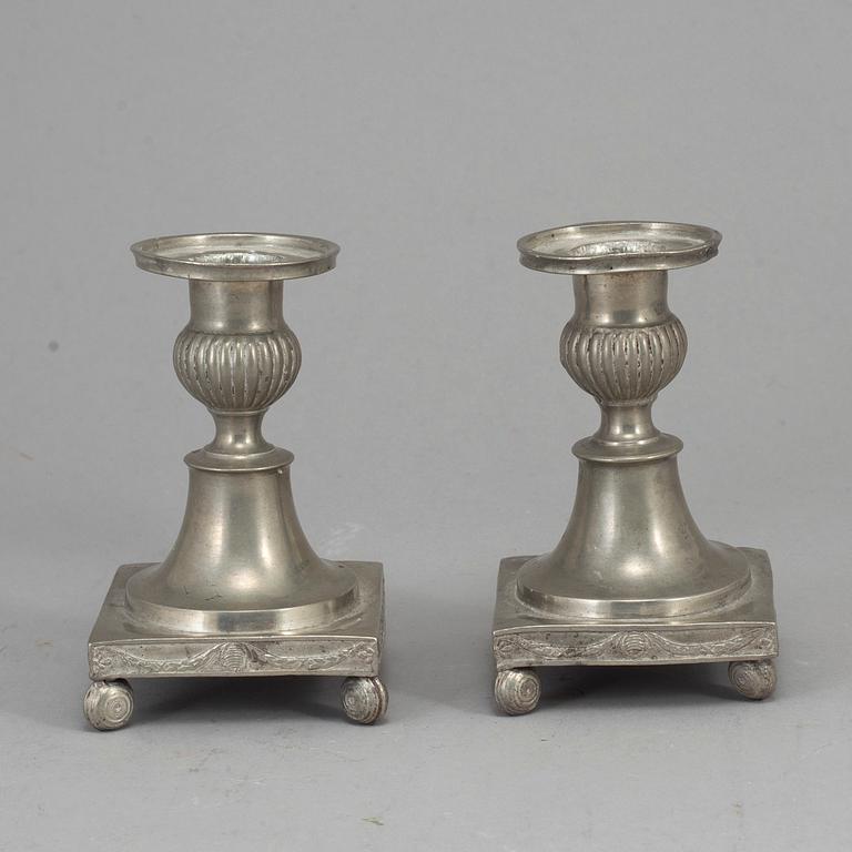 A pair of Swedish late gustavian pewter candlesticks, early 19th century.