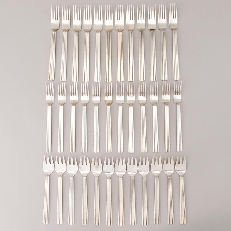 A 106 PIECE SILVER 'Bernadotte' cutlery set for George Jensen Denmark 1945-1977.