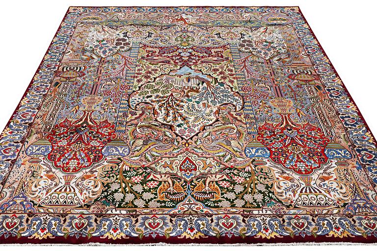 A Kashmar carpet, c. 398 x 294 cm.