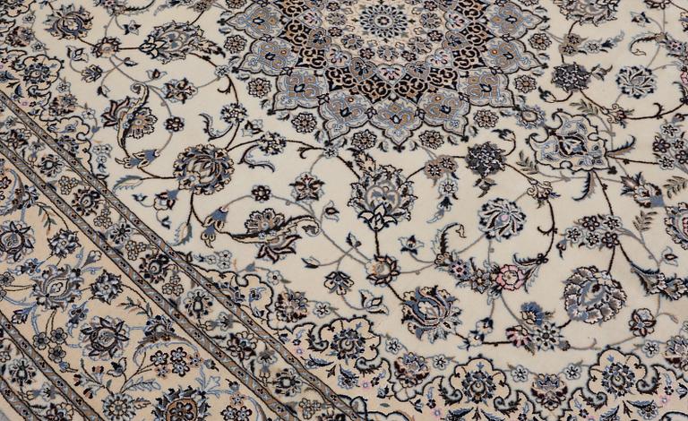 A Nain part silk carpet, 269 x 213 cm.