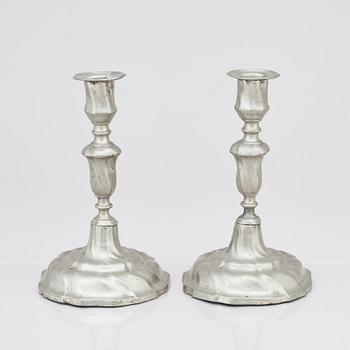 A pair of Rococo pewter candlesticks by C Sauer 1749.