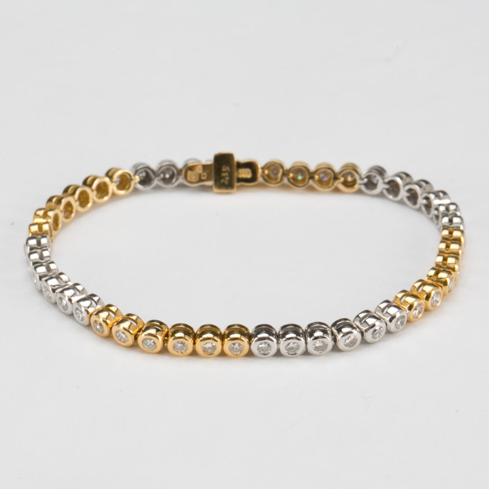 ARMLÄNK, 18k guld -vitguld med briljantslipade diamanter ca 2,35 ct. Vikt ca 15 g.