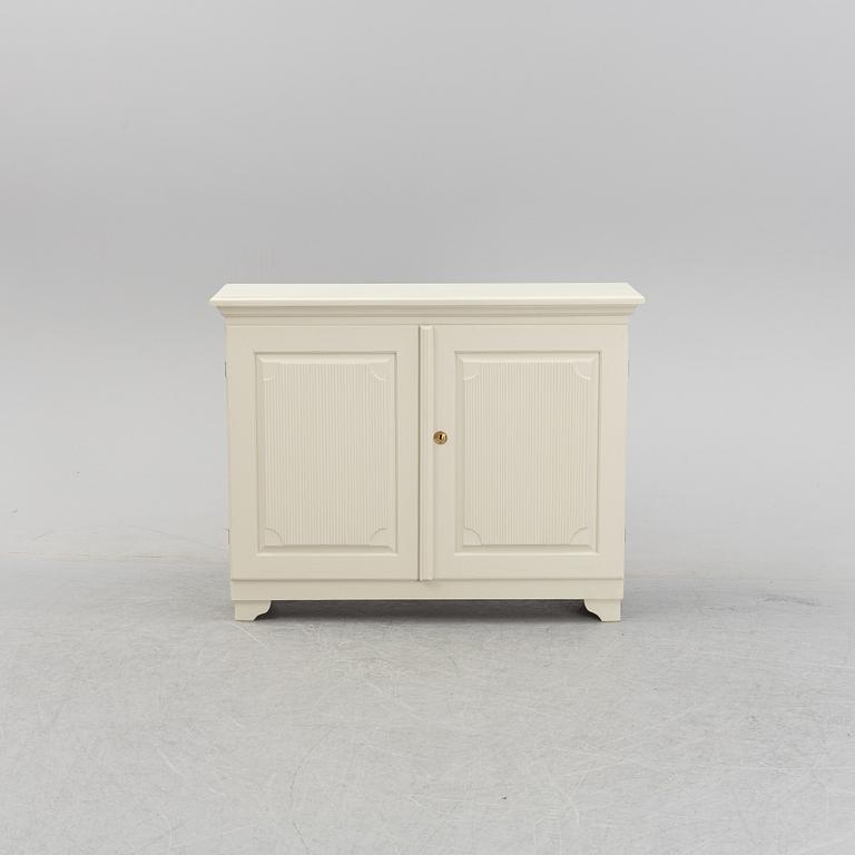 A painted 20th Century cupboard.