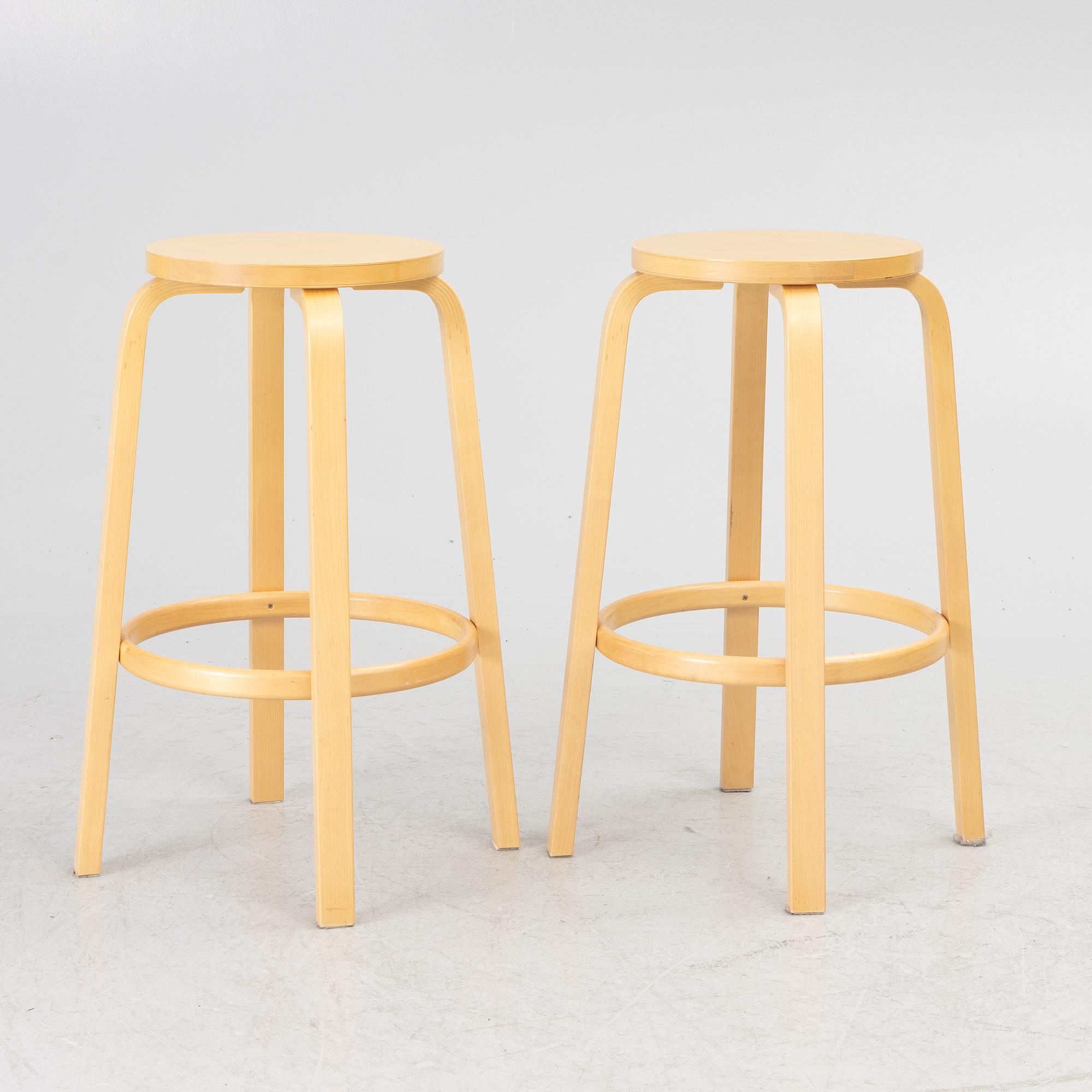 Alvar Aalto, a pair of bar stools, Artek, Finland, 2002.