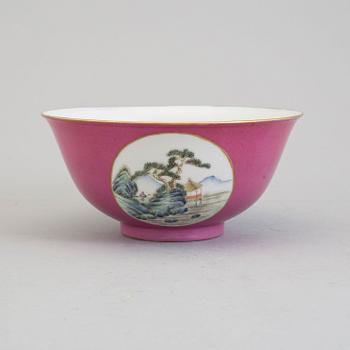 A pink-ground 20th century porcelain bowl, with Guangxus mark to the base.