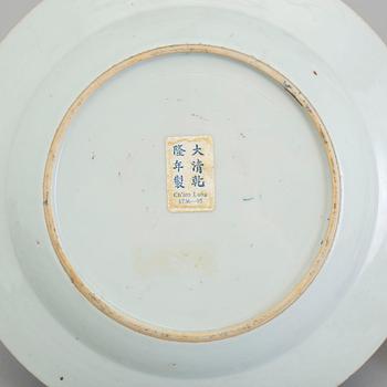 Three famille rose export porcelain plates, Qing dynasty, early 18th century.