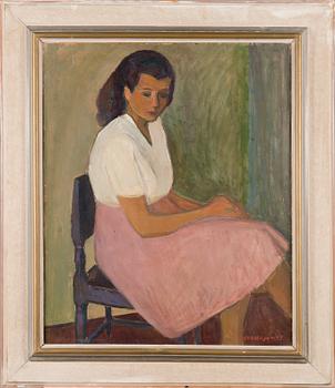 VEIKKO VIONOJA, A WOMAN SITTING.